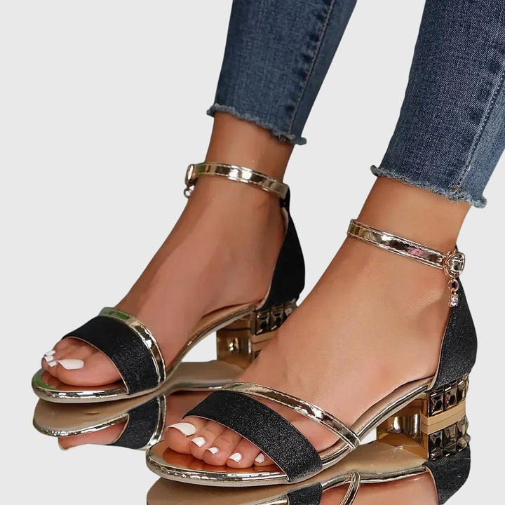 Stylish women's heeled sandals with adjustable straps, perfect for summer dresses and walking comfort.