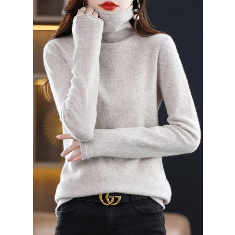 Soft women's long sleeve pullover. Warm roll neck sweater, essential for winter fashion.