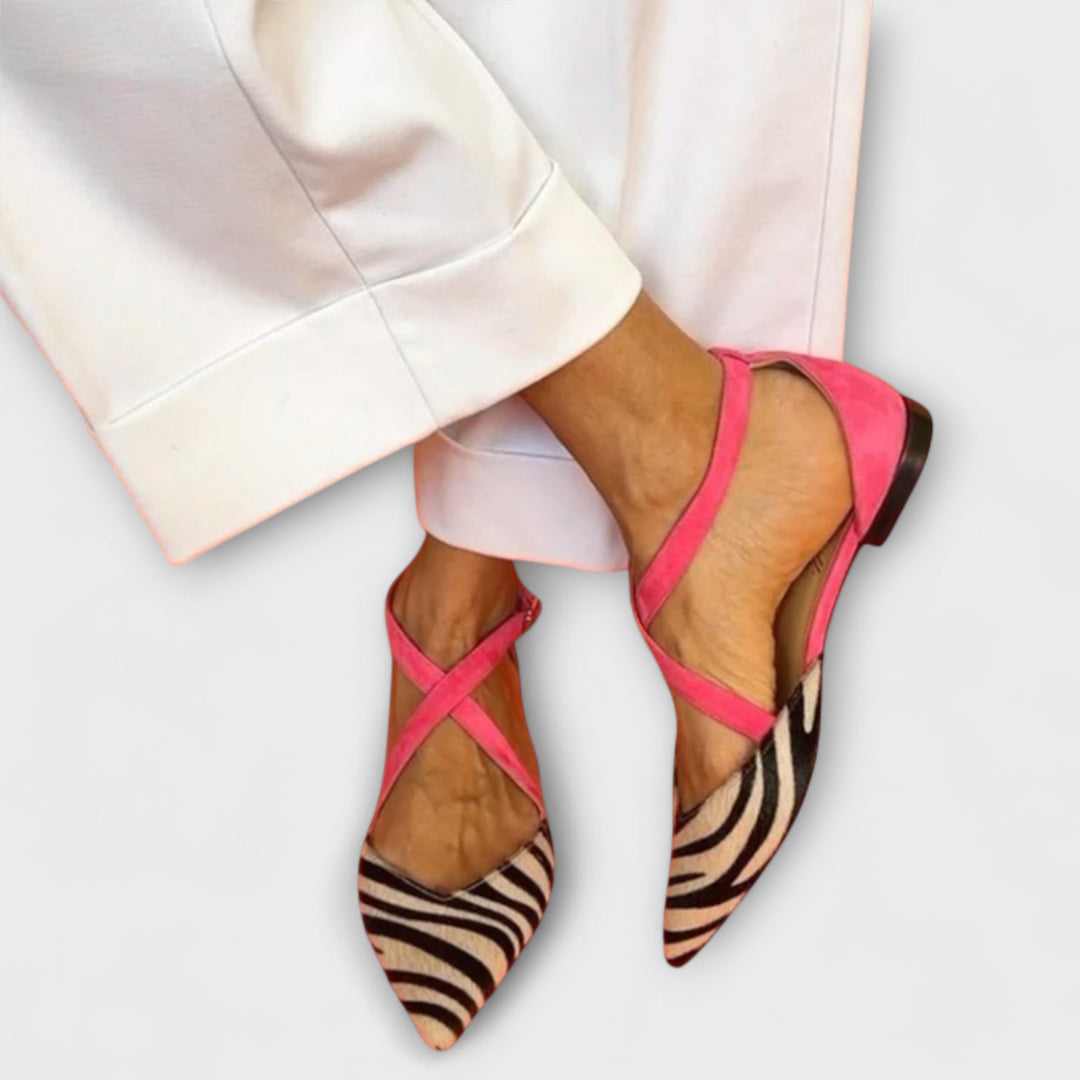 Elegant women's loafers with chic band detail, perfect for everyday style. Comfortable slip-on flat shoes.