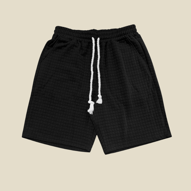 Versatile men's waffle-knit shorts in green, perfect for comfortable everyday wear or relaxed weekend styling.