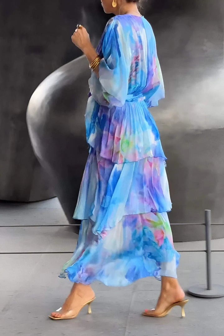 Women's draped layered maxi dress, embodying a bohemian aesthetic. Perfect for summer events & beach vacations.