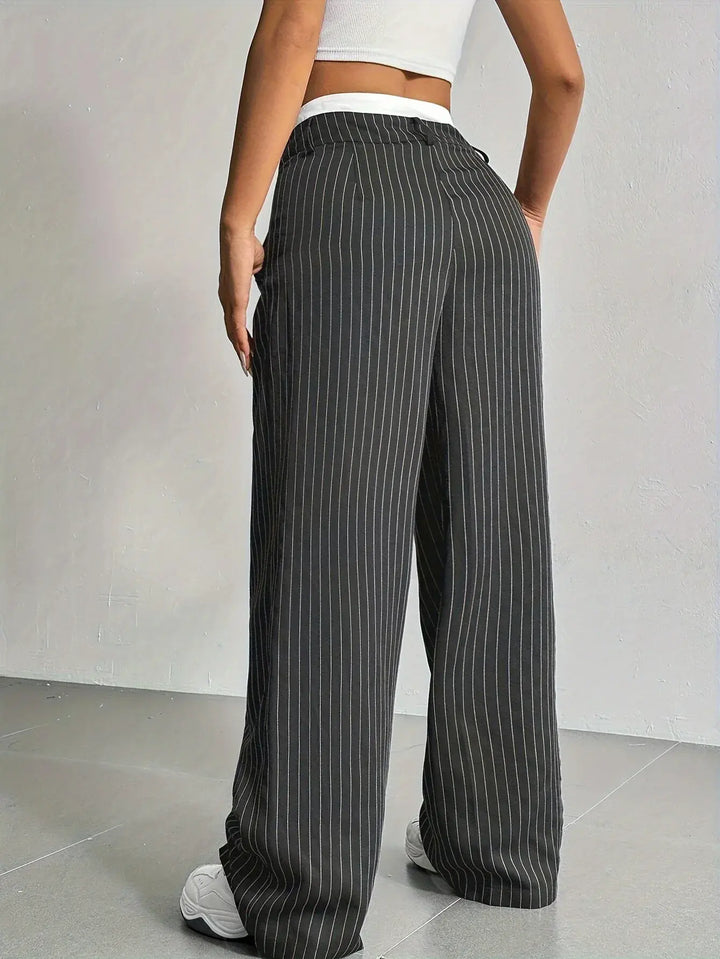 Women's striped wide leg trousers, versatile for daily or office wear.