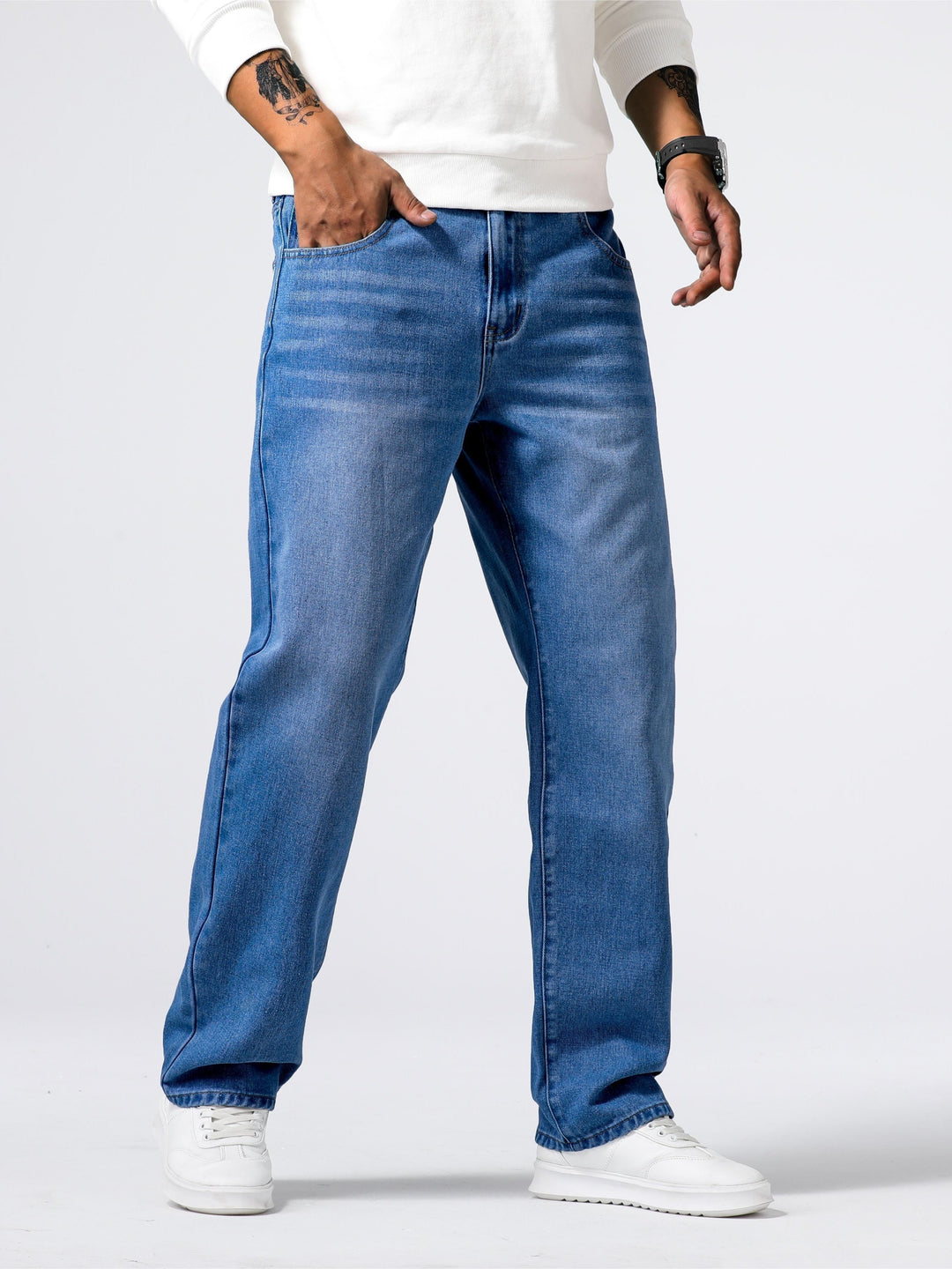 Washed denim men's straight leg jeans, ideal classic fit casual pants for everyday fashion.