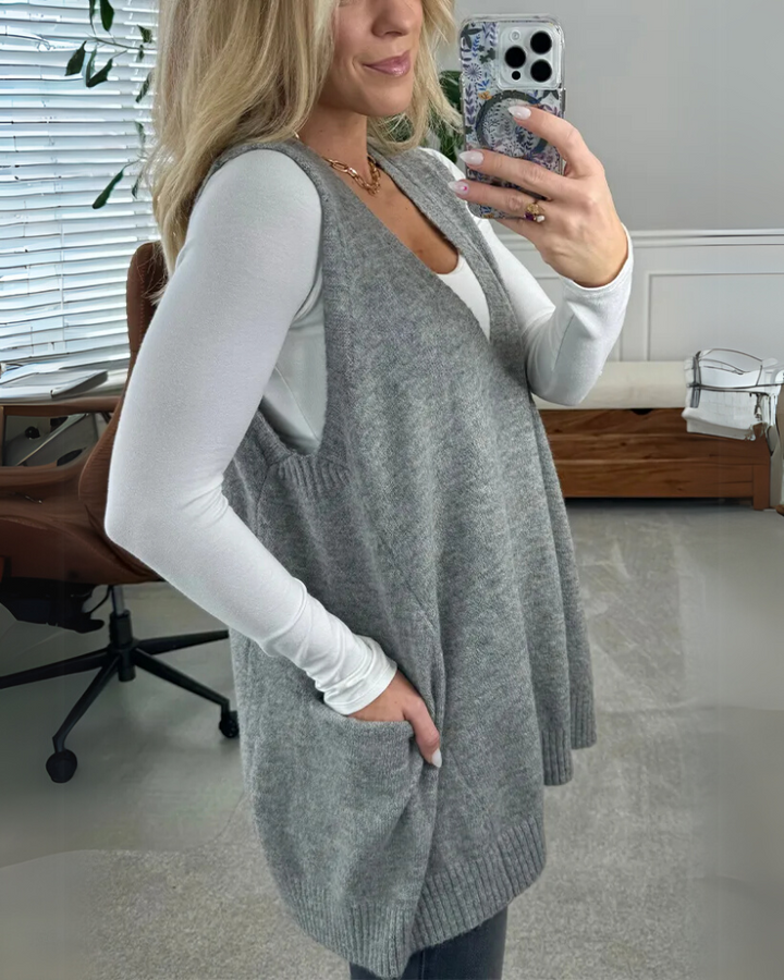 Stylish & comfortable women's layering vest, an A-line outerwear piece with pockets for any fall outfit.