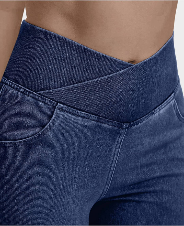Dark blue high-waist stretch women's jeans, versatile slim fit denim for comfortable casual wear.