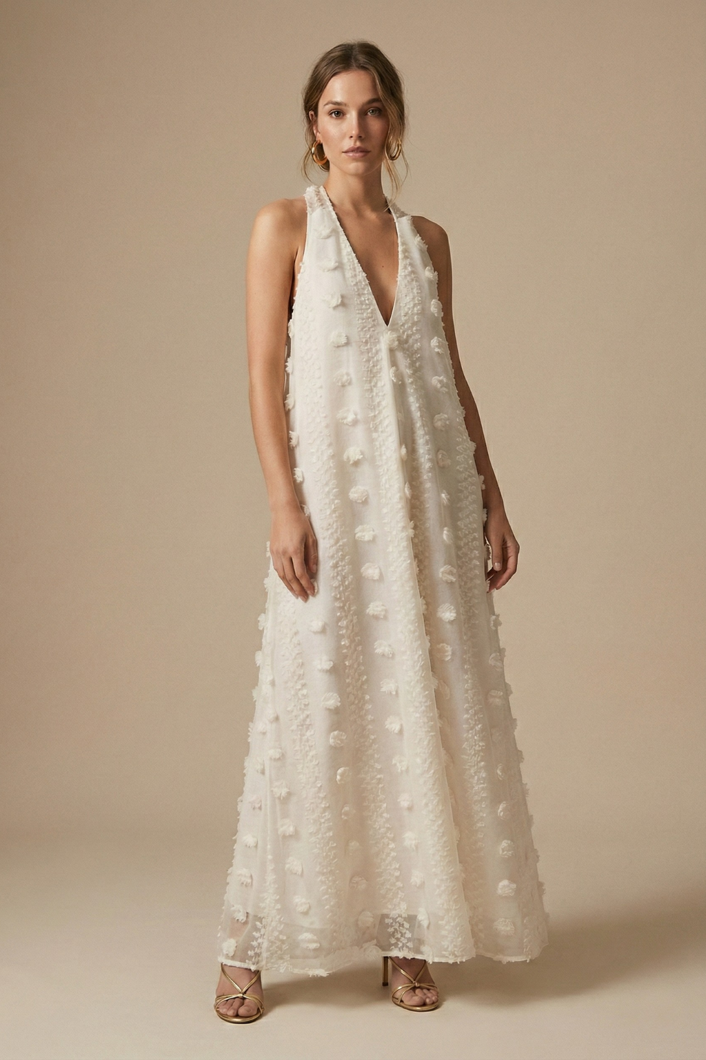 Elegant women's halter backless maxi dress with delicate 3D floral appliqué, perfect for summer evenings & resorts.