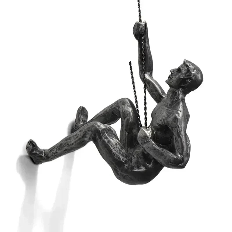 Modern abstract climbing figures, a striking wall sculpture set for contemporary homes.