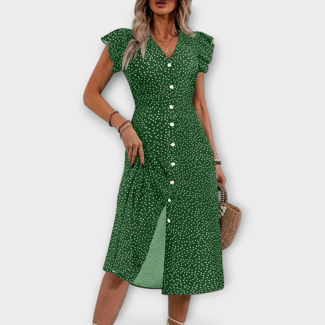 Elegant polka dot A-line midi dress with a V-neck, a fashionable choice for women's summer wardrobe.