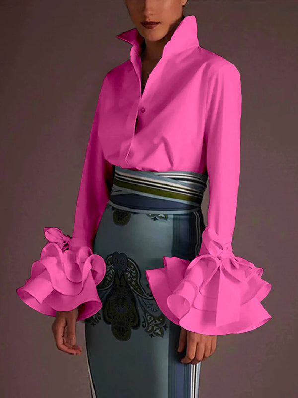 Women's elegant tiered ruffle blouse, button-up design. Chic top with stylish flare sleeves for any season.