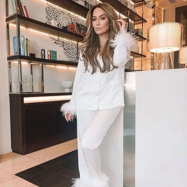 Luxurious women's feather trim satin pajama set, perfect elegant sleepwear for ultimate comfort.