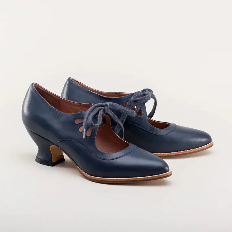 Pin-up style women's Mary Jane heels with sturdy block heel for a classic, elegant retro footwear look.