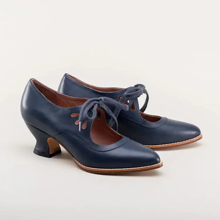 Pin-up style women's Mary Jane heels with sturdy block heel for a classic, elegant retro footwear look.