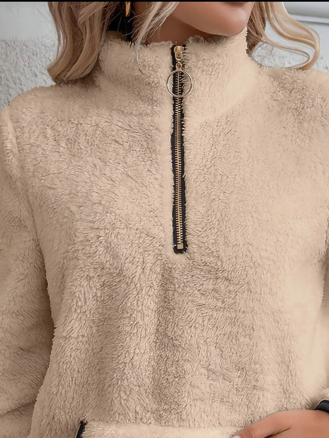 Warm women's half-zip pullover, designed for winter style & cozy comfort.