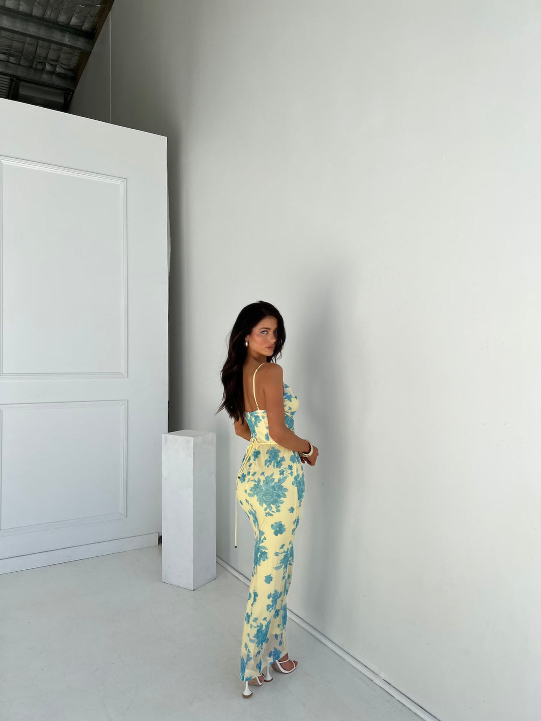 Chic women's cowl neck bodycon maxi dress, offering a flattering silhouette for evening or party attire.
