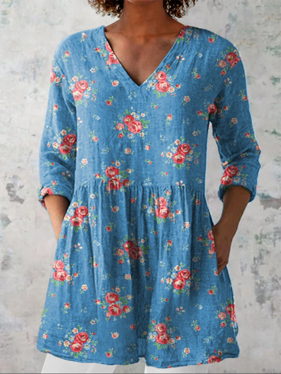 Women's V-Neck Long Blouse in a flowy blue fabric, perfect for casual elegant everyday wear with long sleeves.