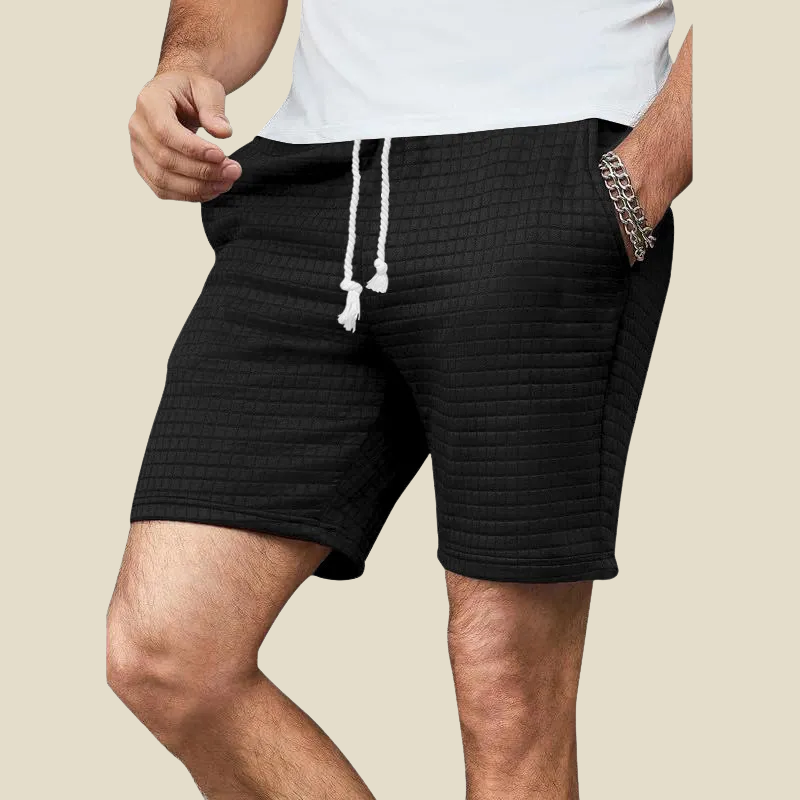 Men's grey waffle-knit shorts, relaxed fit for ultimate comfort & casual style. Perfect everyday lounge shorts.