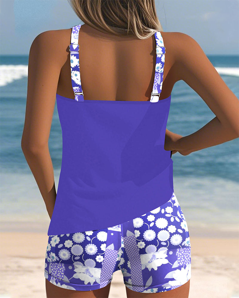 Stylish women's printed swimwear set. Comfortable tankini top and shorts for summer vacation.