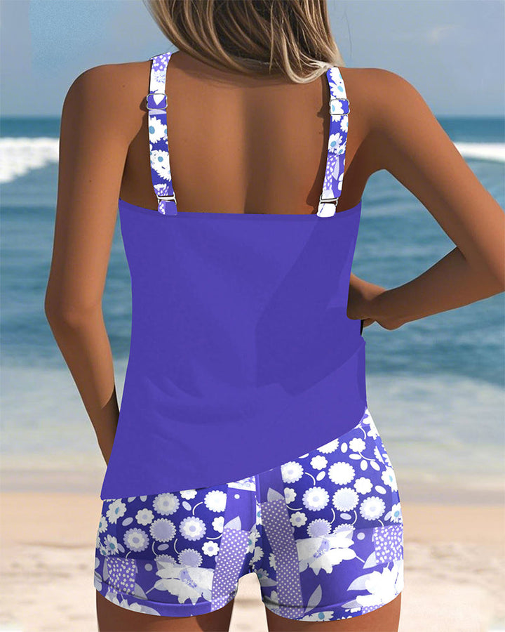 Stylish women's printed swimwear set. Comfortable tankini top and shorts for summer vacation.