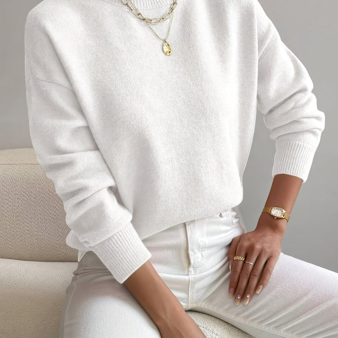 Soft high neck jumper for women, a warm and stylish autumn essential.