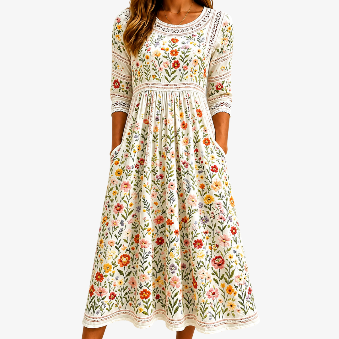 Women's sage midi dress with wildflower meadow print. Elegant, comfortable for summer & spring everyday wear.