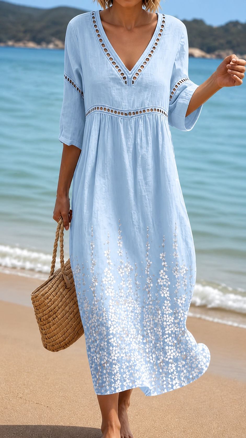 Women's soft blue flowy midi summer dress. Comfortable & flattering for casual wear or elegant occasions.