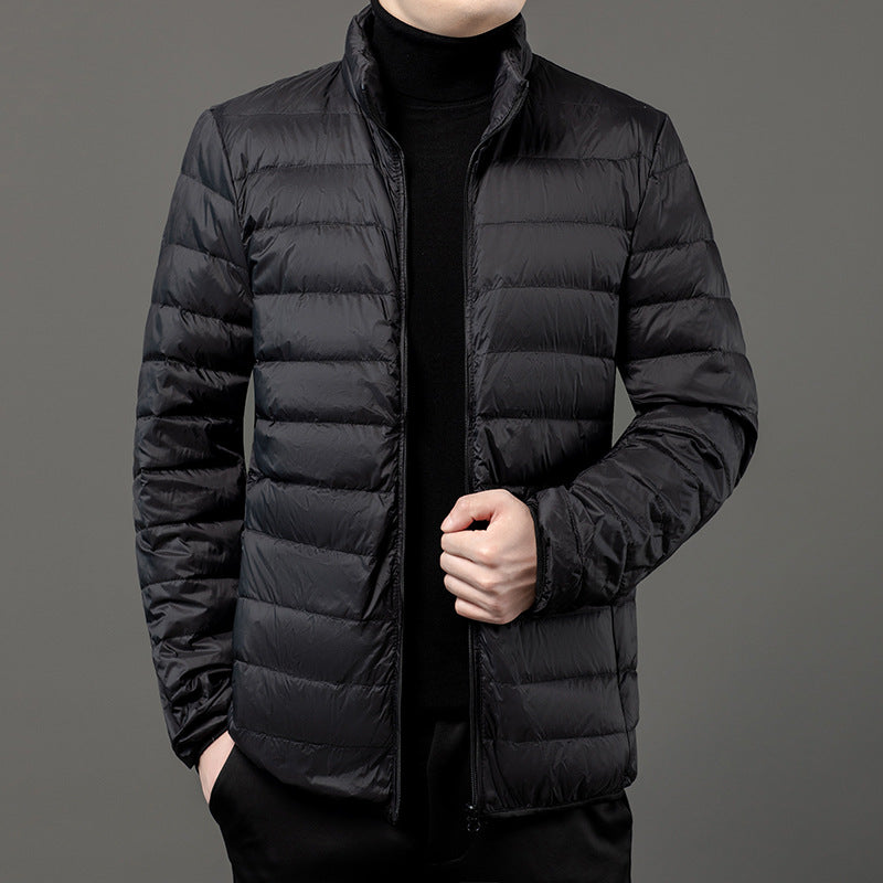 Modern men's slim-fit puffer jacket, lightweight design with quilting, versatile for everyday fall & winter style.