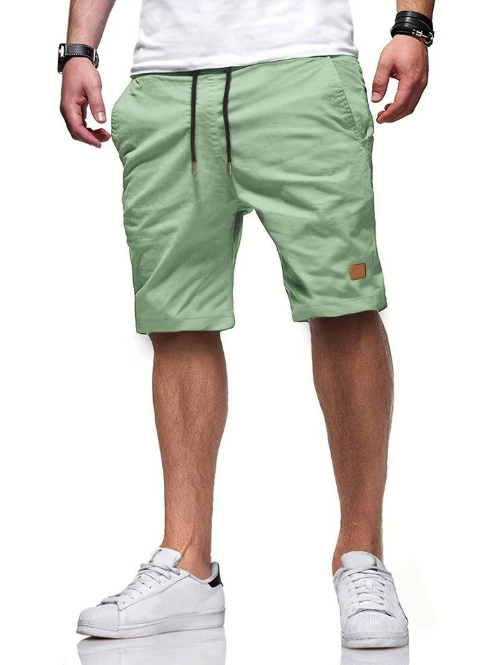 New men's casual drawstring shorts, comfortable & stylish for summer & active wear.
