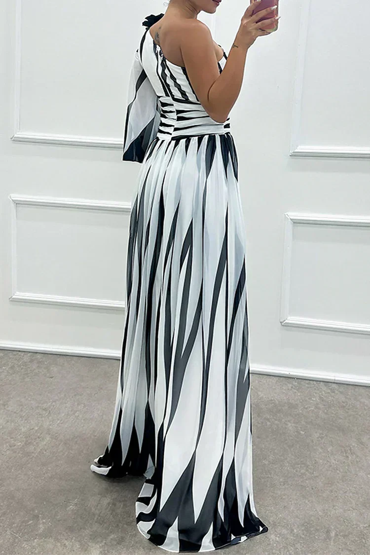 Formal women's striped one-shoulder maxi dress with a stylish leg slit. Perfect for special evening occasions.
