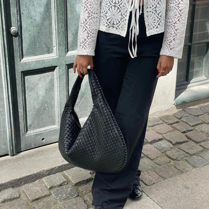 Everyday women's woven shoulder bag, soft vegan leather, practical & chic accessory.
