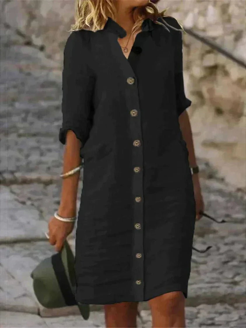 Black classic midi dress for women. Comfortable summer style, an elegant and versatile addition to any wardrobe.