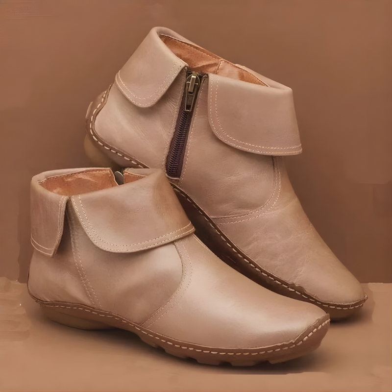 Stylish women's waterproof outdoor boots with arch support, cushioned for all-weather comfort & durability.