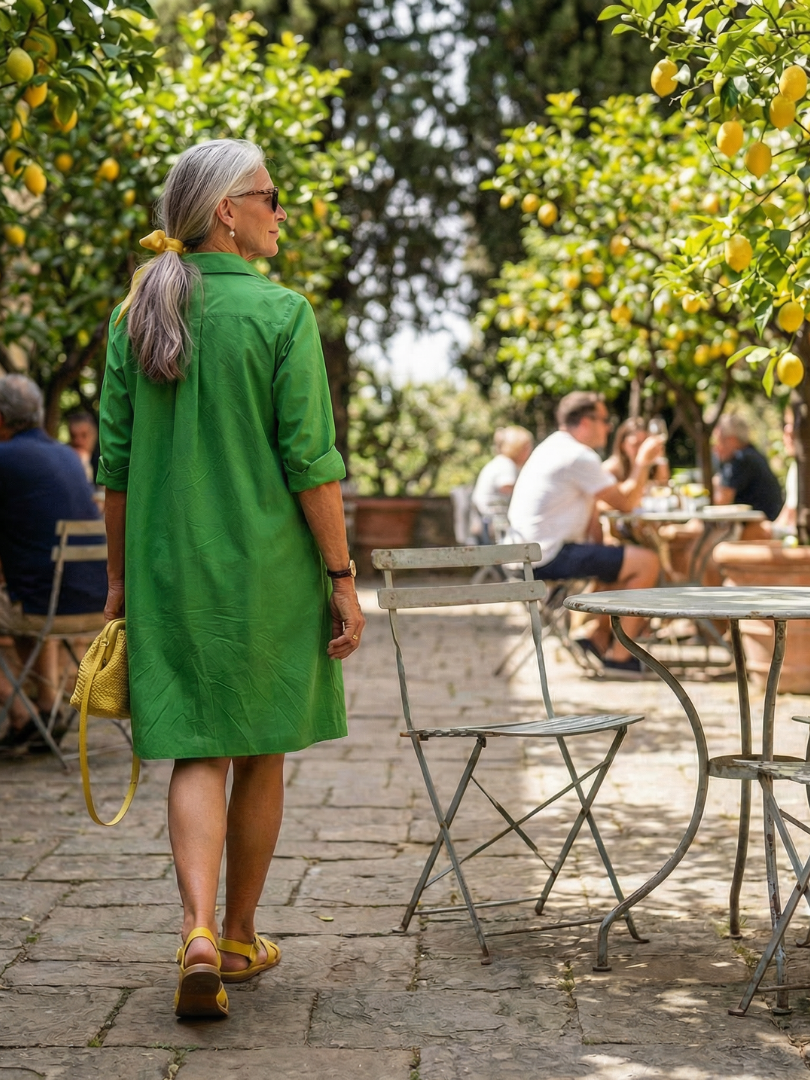 Versatile women's casual garden dress. Kneelength, collared, and pockets for comfortable, relaxed summer days.