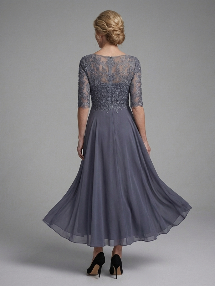 Comfortable women's elegant blue lace midi dress with sheer sleeves, A-line cut for special occasions.