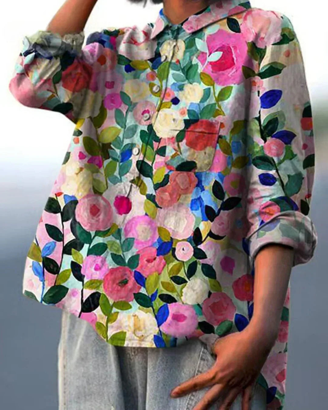 Women's vintage floral blouse with puff sleeves and V-neck, elegant for spring/summer casual chic.