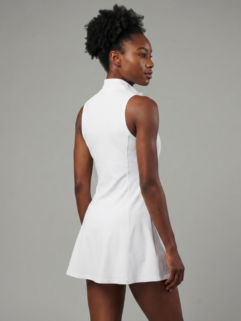 Comfortable women's activewear tennis dress, mini length, featuring convenient built-in shorts for workouts.