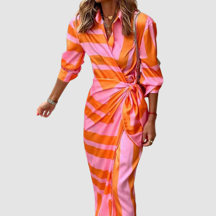 Elegant women's striped midi dress, perfect for office wear or a chic day out. Comfortable summer fashion.