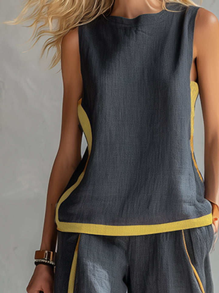 Chic & comfortable women's wide leg trouser set with a matching elegant sleeveless top. Ideal for summer style.