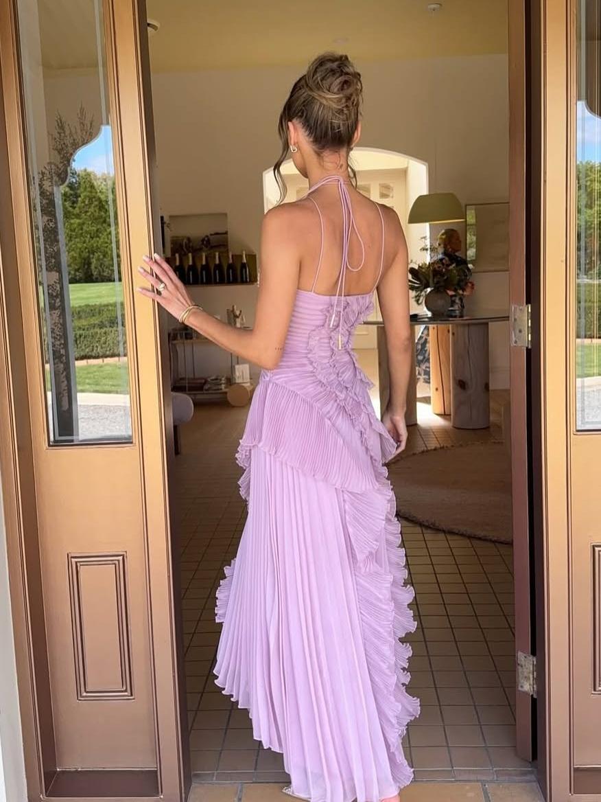 Elegant women's sleeveless maxi dress, perfect for wedding guests.