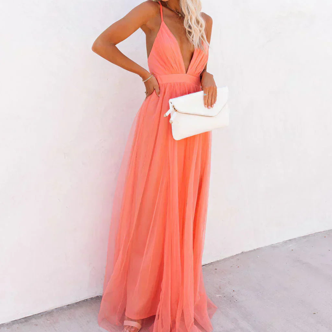 Light coral apricot maxi dress for women, featuring a beautiful flowy design, great for warm weather.
