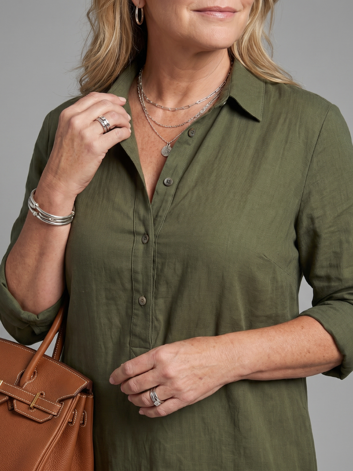 Elegant collared maxi dress for women, featuring long sleeves & button front, ideal for casual or everyday wear.