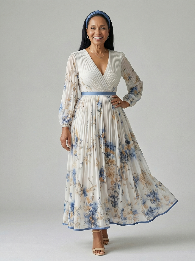 Versatile women's elegant pleated wrap midi dress in white with a floral pattern, long sleeves, ideal for day or evening wear.
