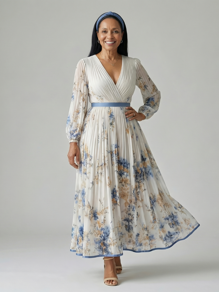 Versatile women's elegant pleated wrap midi dress in white with a floral pattern, long sleeves, ideal for day or evening wear.