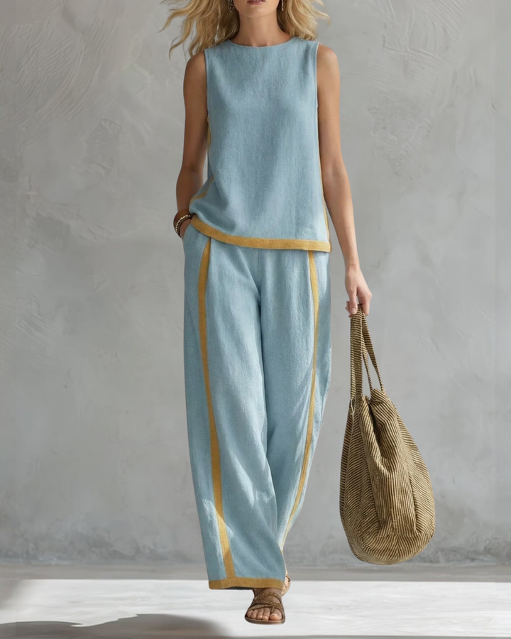 Women's matching set: elegant sleeveless top & comfortable wide leg trousers. Chic for summer or versatile everyday wear.