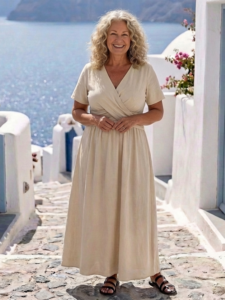 Stylish women's short sleeve V-neck wrap midi dress in beige, ideal as a casual summer or elegant day dress.