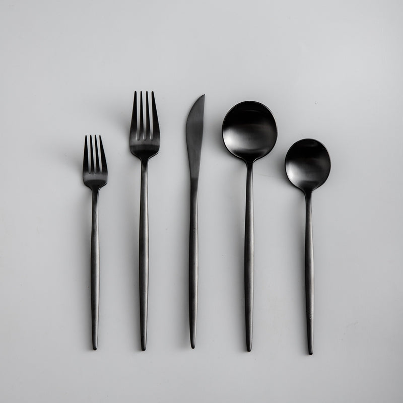 Luxury black cutlery set, modern flatware for upscale entertaining.
