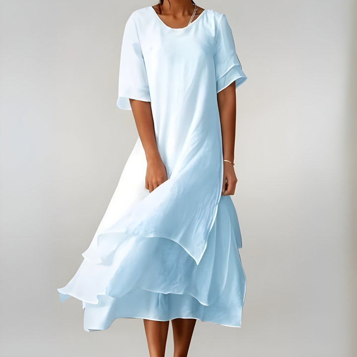 Yellow flowing long dress for women. Lightweight, elegant, and comfortable, a versatile summer day or vacation dress.