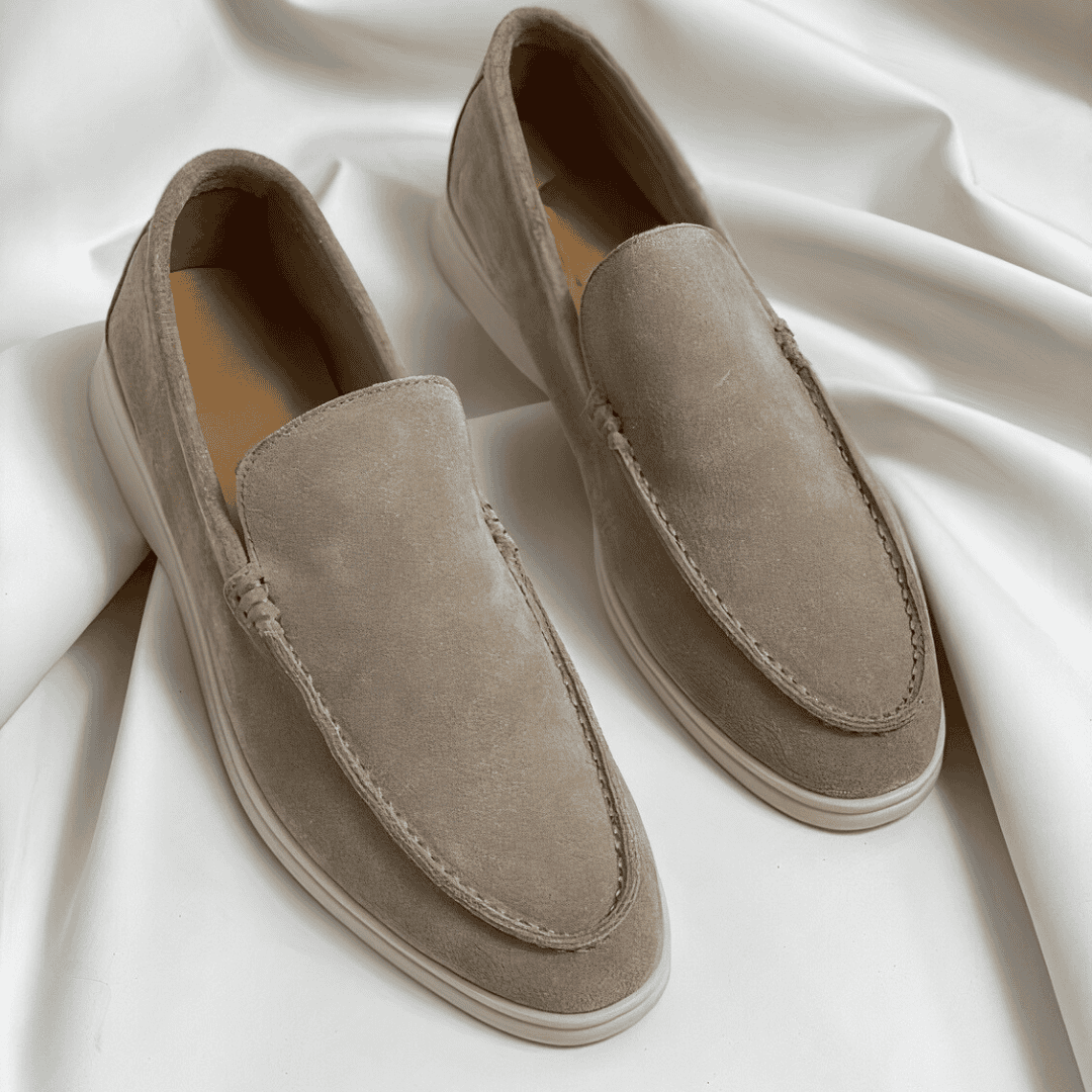 Brown classic men's loafers, comfortable and stylish for both casual and dressy occasions.