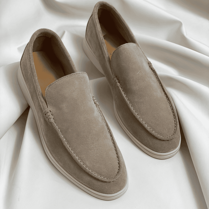 Brown classic men's loafers, comfortable and stylish for both casual and dressy occasions.
