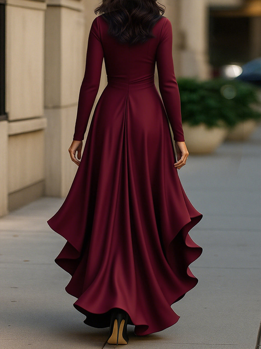 Flowing pleated maxi dress for women with V-neck, ruffles, and long sleeves. Ideal for elegant evenings.