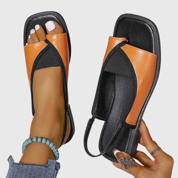Stylish women's slip-on square toe flat sandals, perfect for casual summer outings and beach comfort.